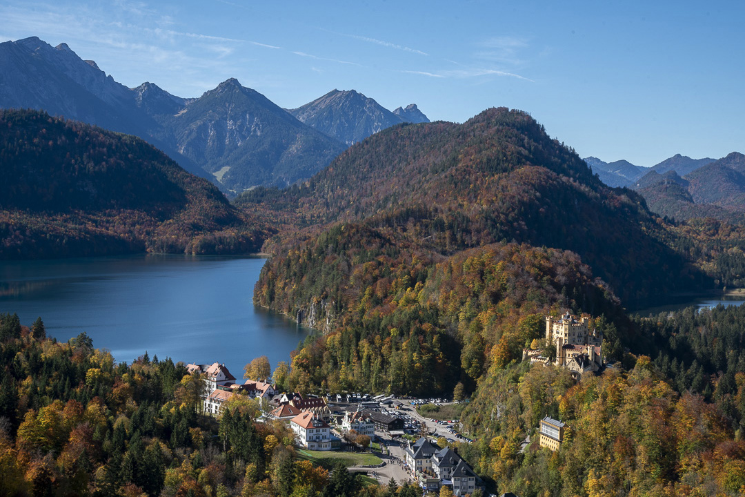 Autumn View of Hohenschwangau with lake and the Alps